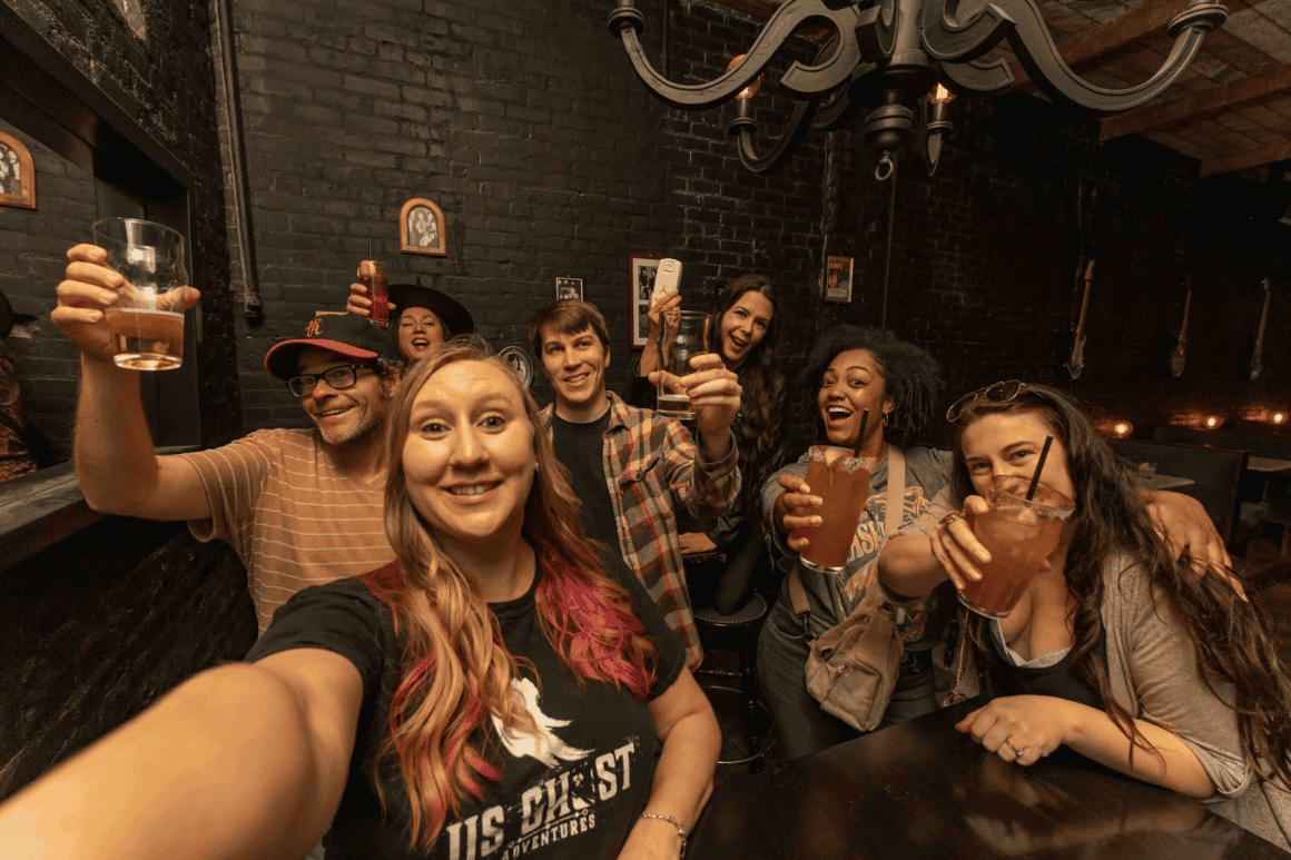 Group of friends on a haunted pub crawl in the USA - haunted USA 